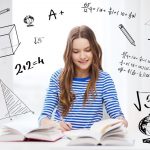 happy smiling student girl with books